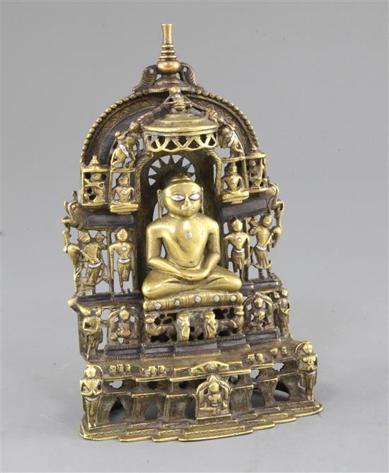 An Indian bronze and silver inlaid Jain shrine, dated 1471, height 21.5cm